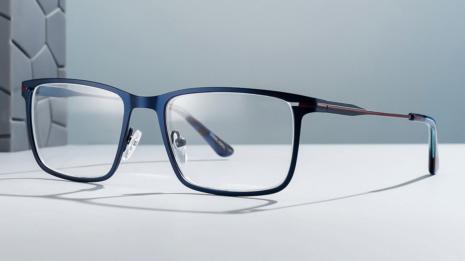 A pair of stylish blue rectangular glasses.